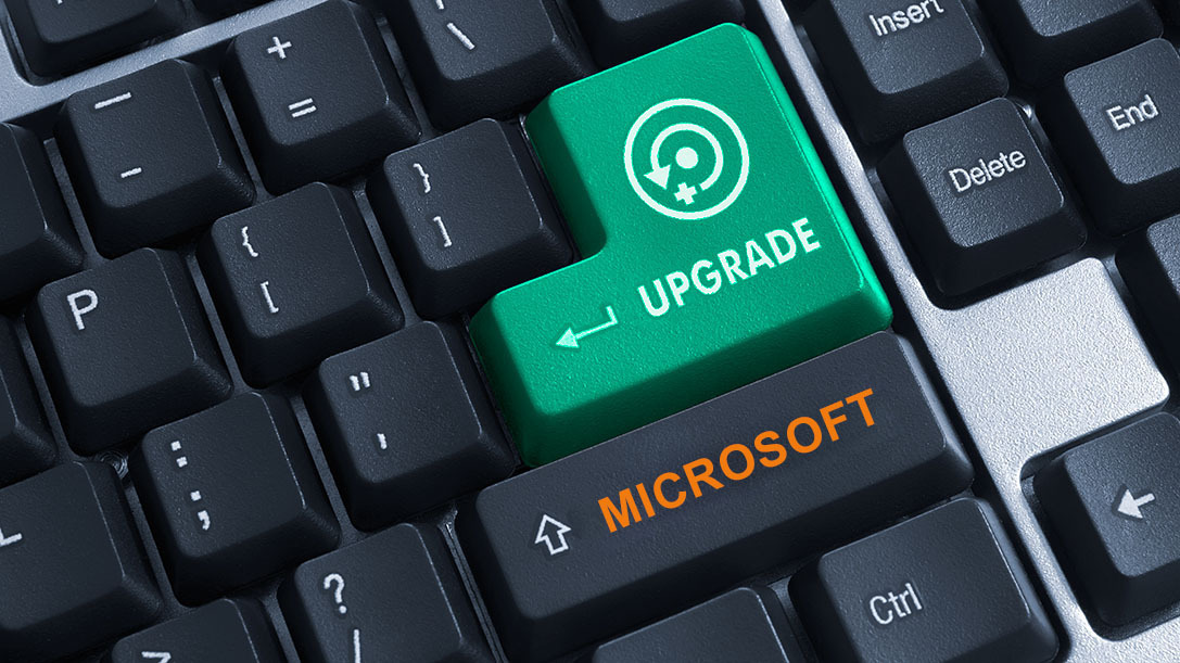 Tastatur mit einer orangenen Taste "Microsoft" und einer grünen Taste "Upgrade"